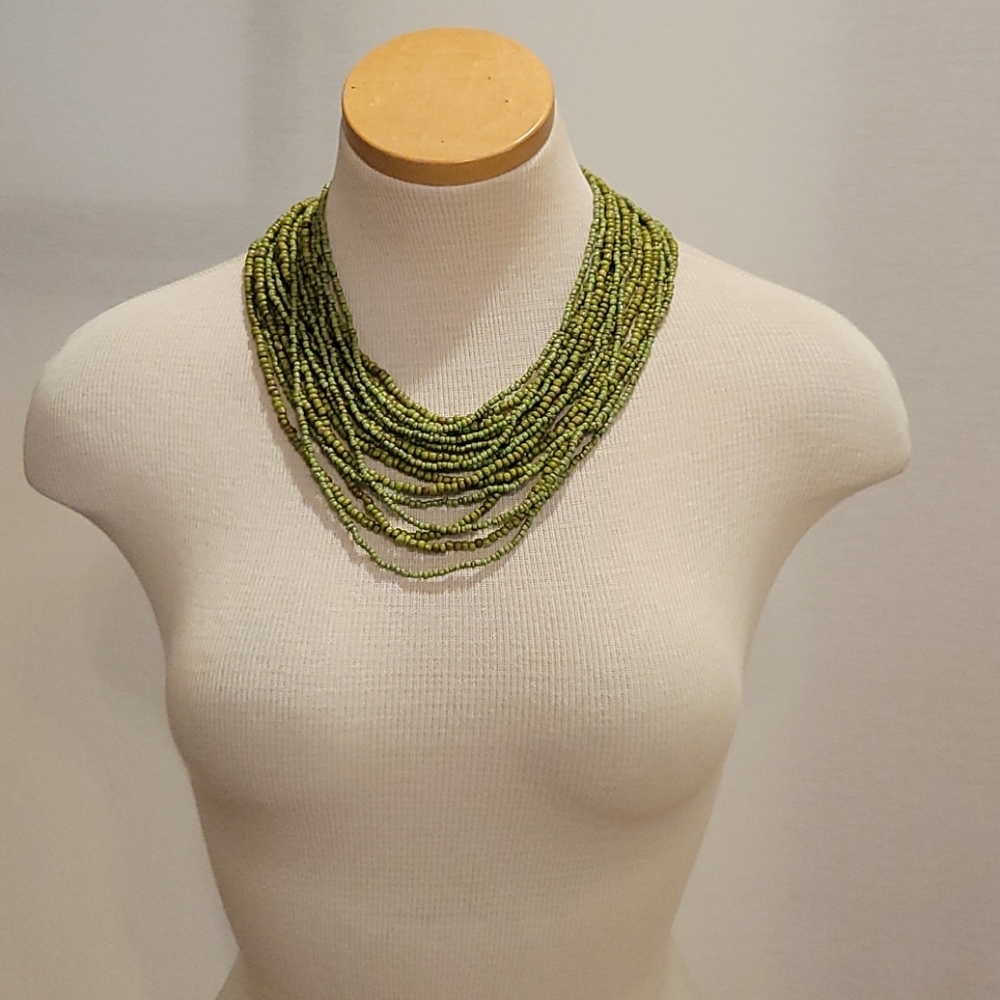 Beaded Green necklace with wooden clasp
